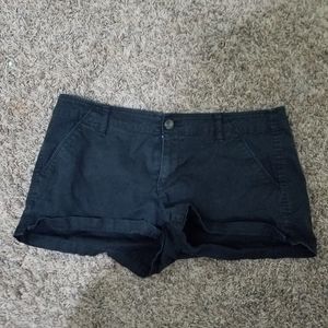 Black denim shorts.